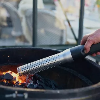 Electric lighter for lighting charcoal and briquettes